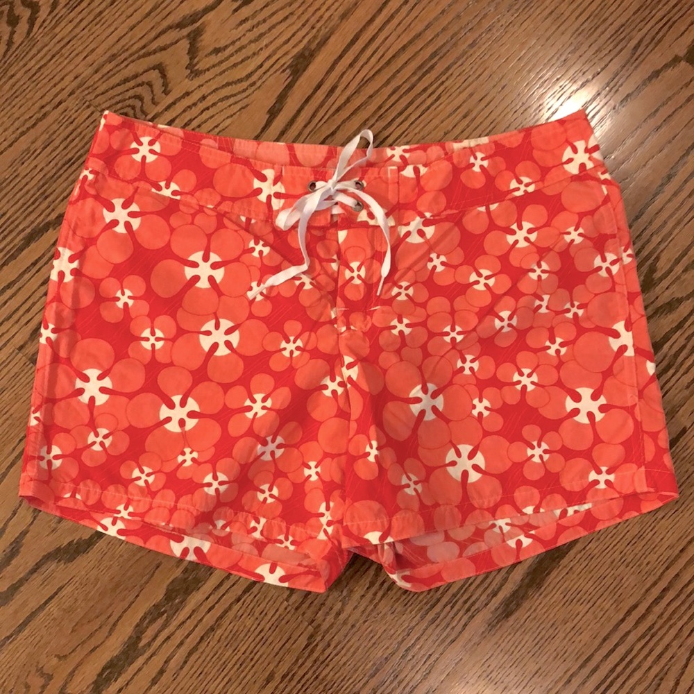 Water Girl by Patagonia, pink hibiscus board short, size 10.